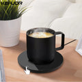 The electric mug warmer, heating up a cup of coffee.