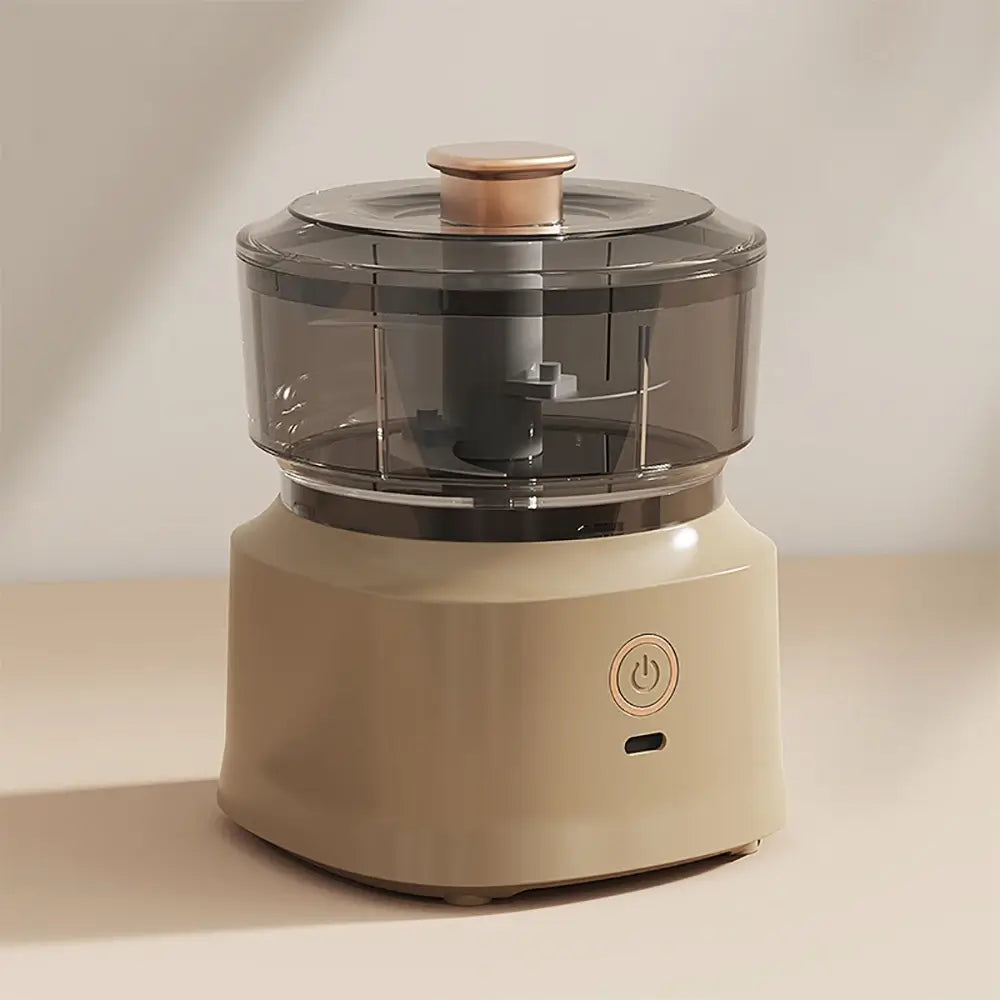 The mini electric meat grinder mincer machine in brown.