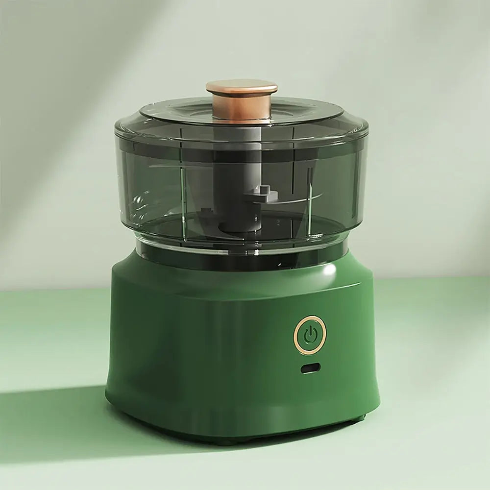 The mini electric meat grinder mincer machine in green.