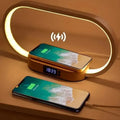 The wireless charger night light charging 2 phones, one wireless and one via USB cord.